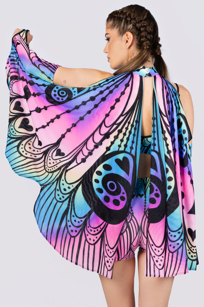 achterkant van vrouw met pastel regenboog set inclusief vleugels