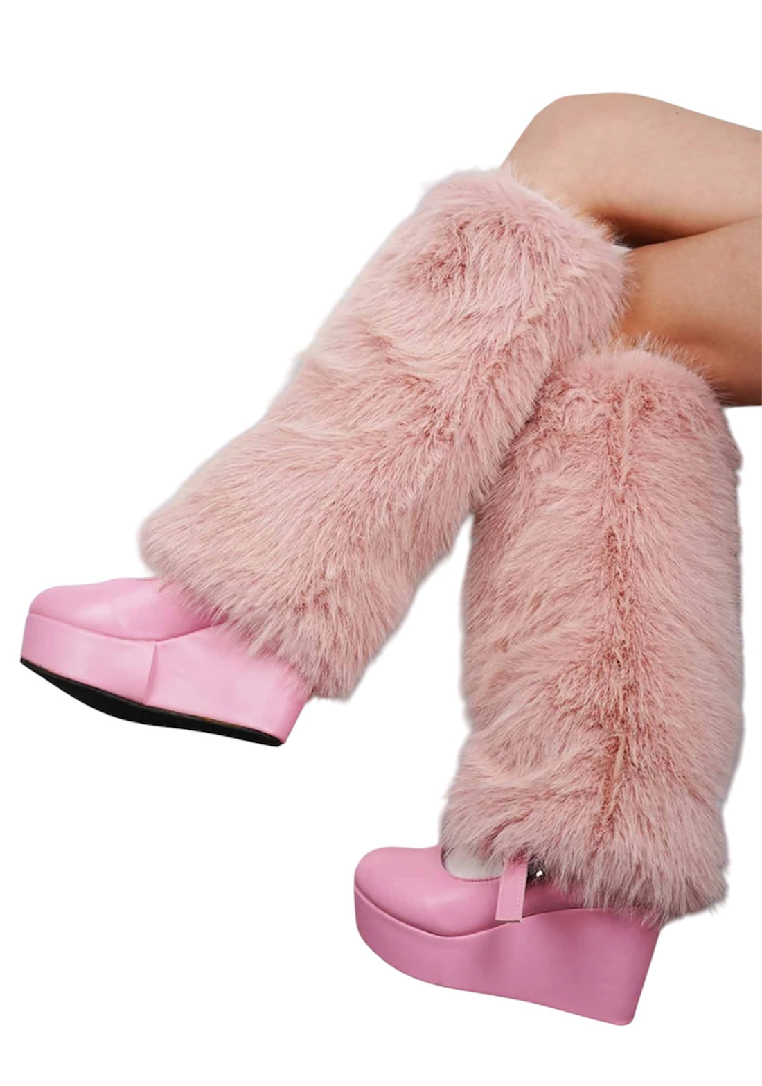 benen met roze beenwarmers en roze schoenen