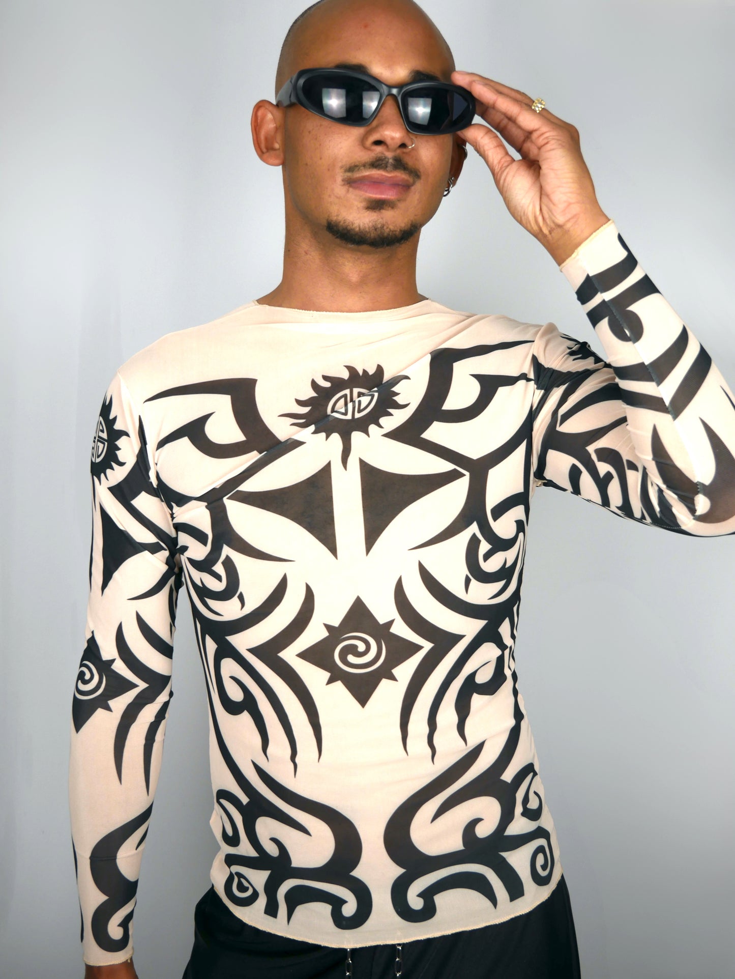 man met tribal shirt nude longsleeve
