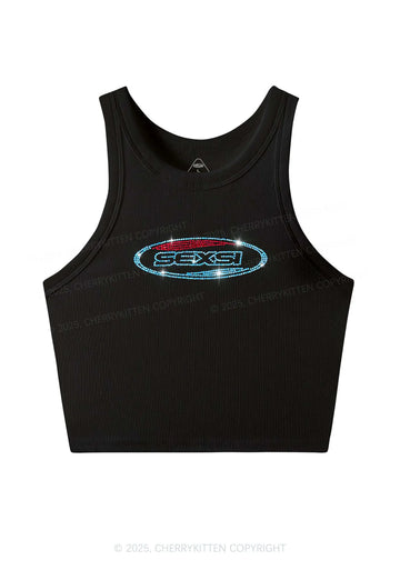 zwarte tanktop met het woord sexsi in strass